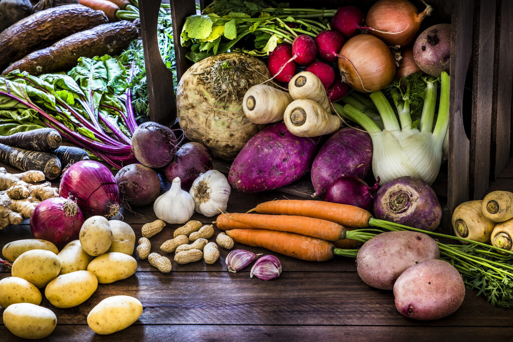 healthy food: organic roots, legumes and tubers still life.